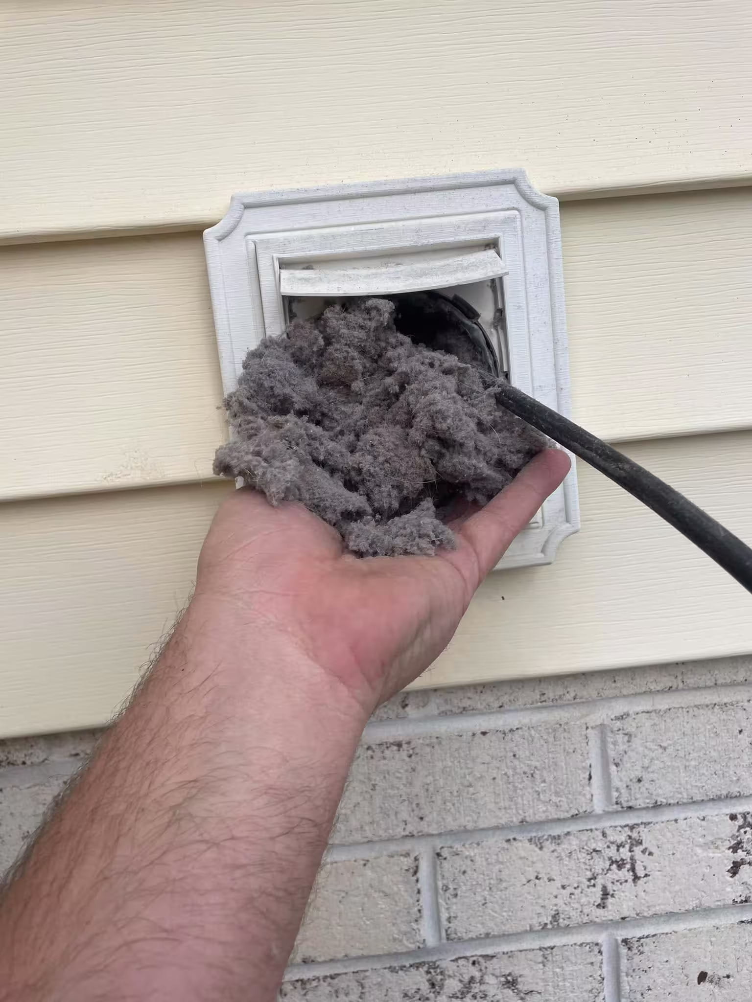 Lint coming out of dryer vent